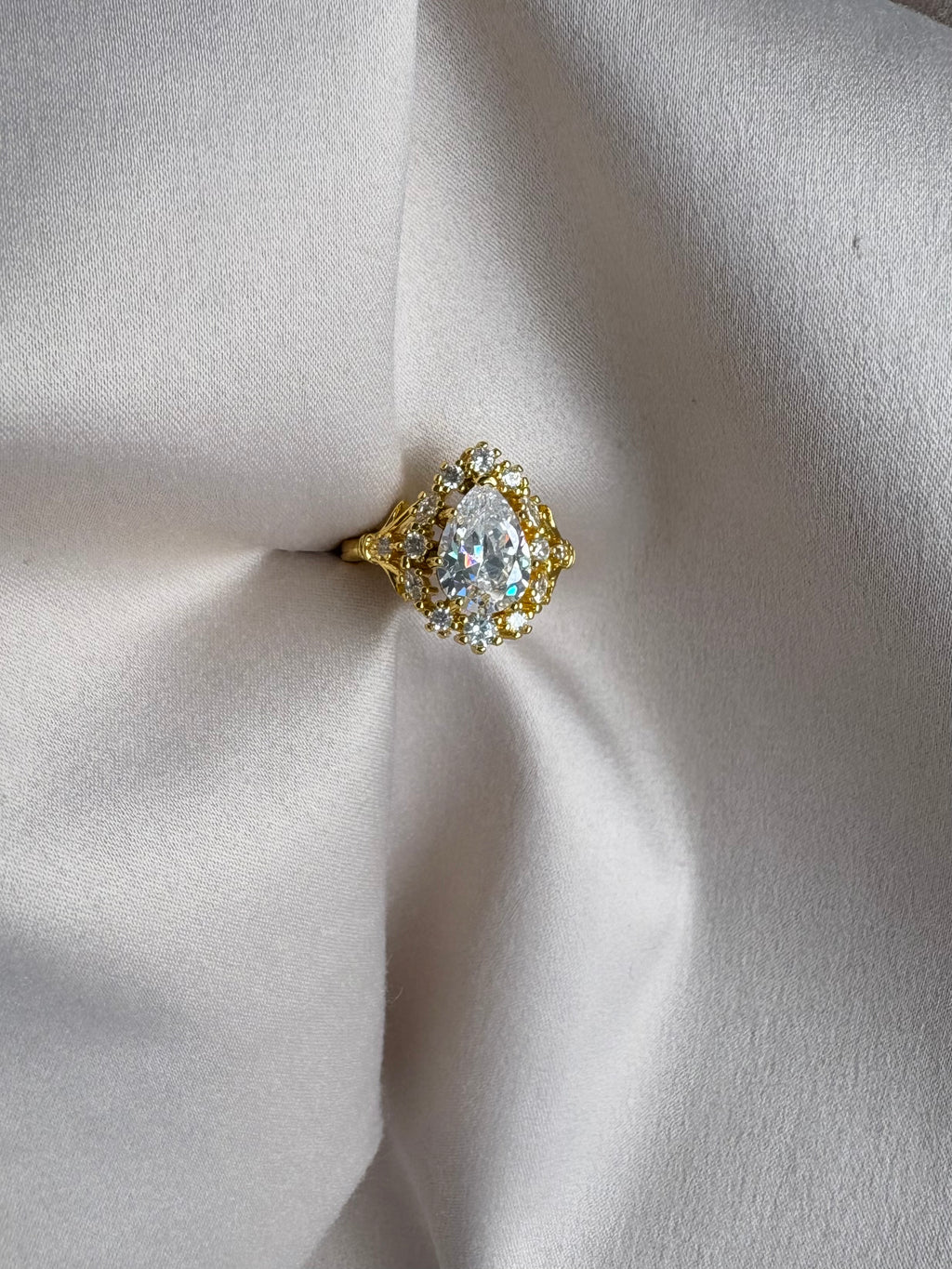 Studded white zircon ring
