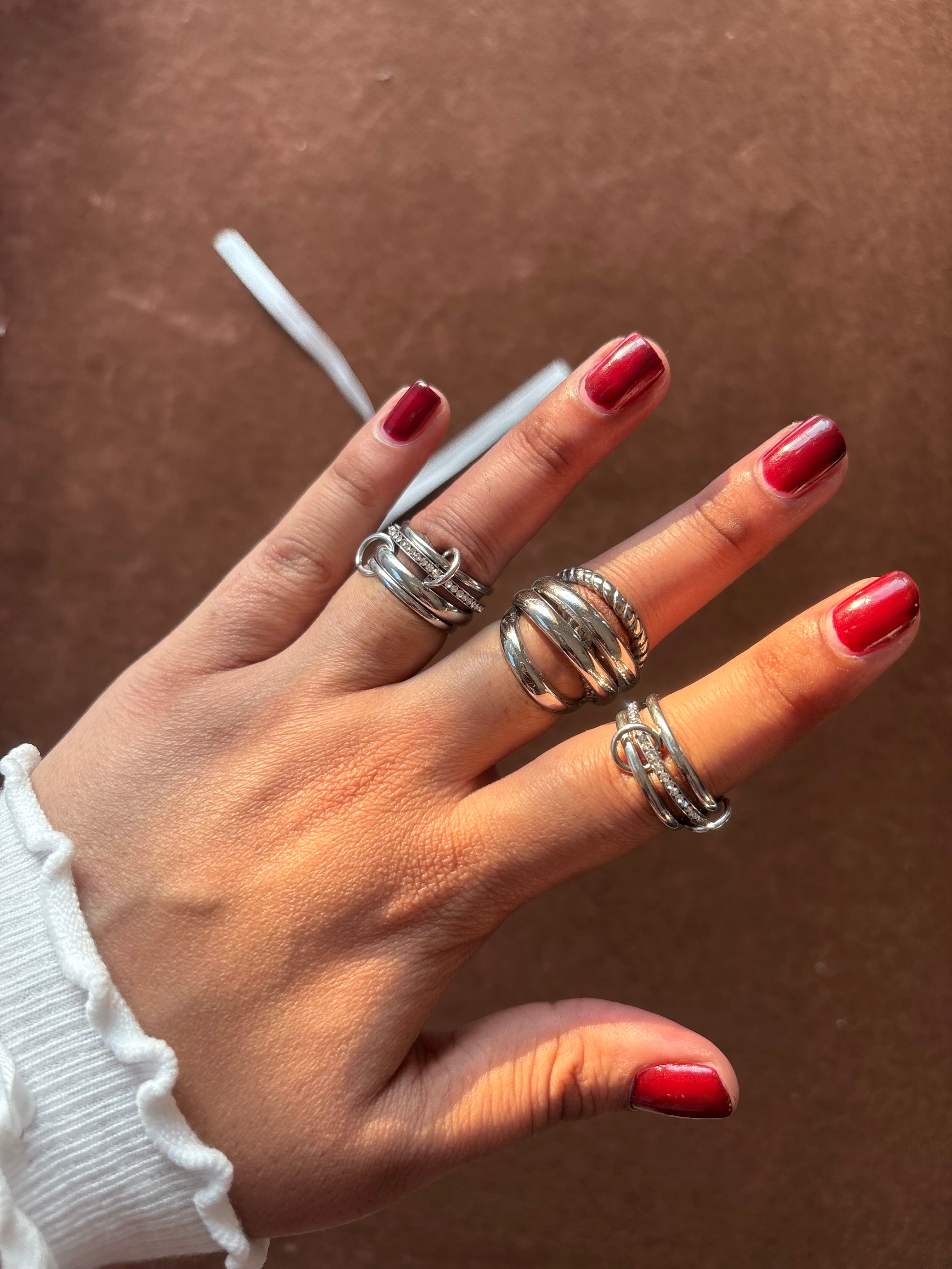 Four tier silver ring