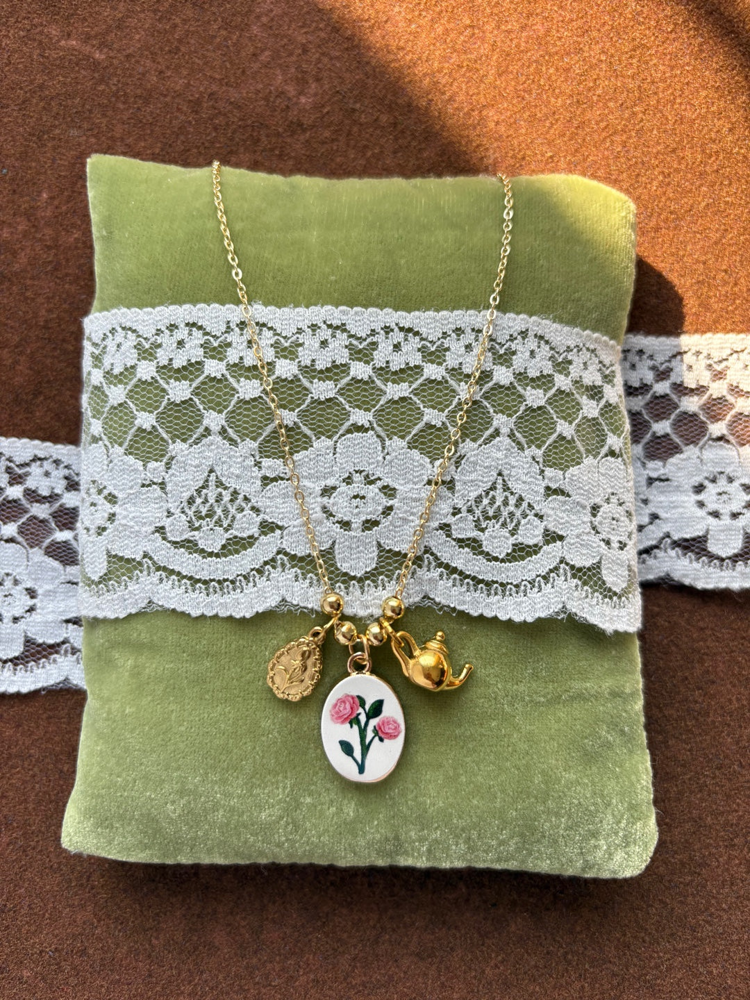Floral charm jumble necklace